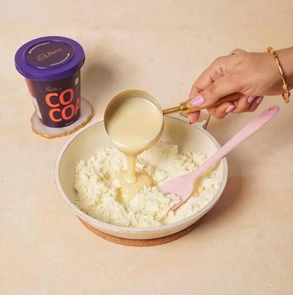 Chocolate Pedas-Gradually pour in the condensed mil