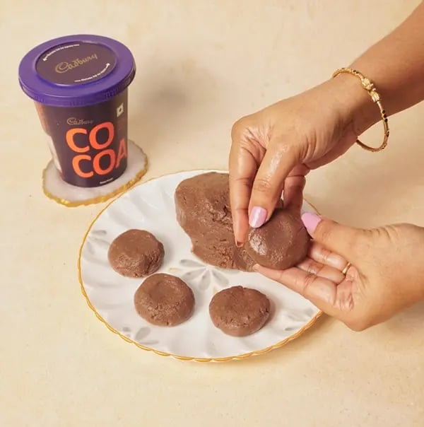 Chocolate Pedas-Allow the mixture to cool slightly