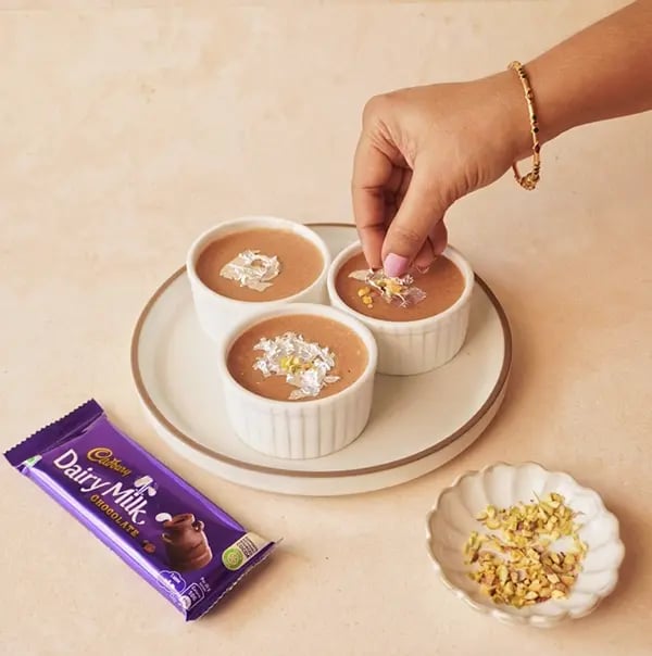 Chocolate Phirni with Cadbury Dairy Milk-Garnish with silver vark