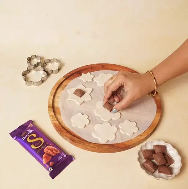 Chocolate Puff Pastry Rakhi With Cadbury Dairy Milk Silk For Raksha Bandhan - Place a small piece of Cadbury Silk chocolate