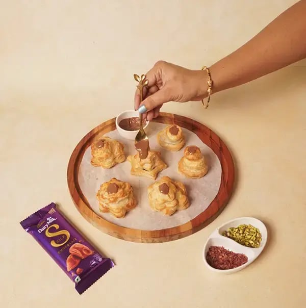 Chocolate Puff Pastry Rakhi With Cadbury Dairy Milk Silk For Raksha Bandhan - Drizzle or spread melted Cadbury SILK chocolate