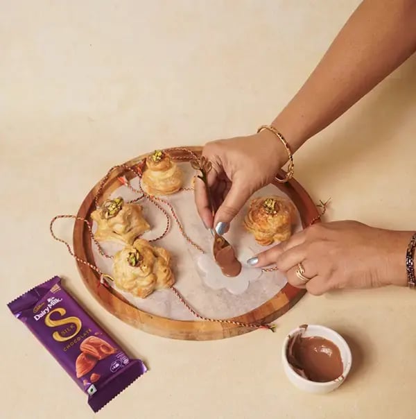 Chocolate Puff Pastry Rakhi With Cadbury Dairy Milk Silk For Raksha Bandhan - Apply a small dollop of melted chocolate