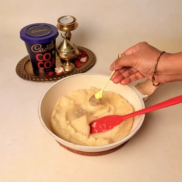 Chocolate Rava Modak With Cadbury Cocoa Powder For Ganpati Bappa - Mixing Cardamom Powder