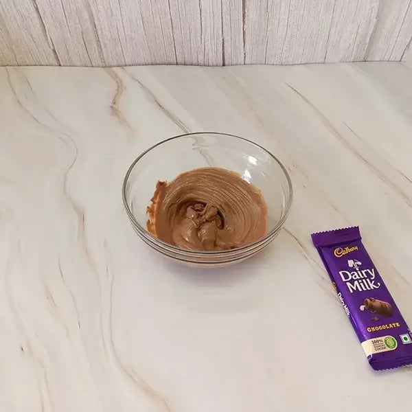 Chocolate Rice Pudding Mousse with Almond Crunch - Melt dark chocolate