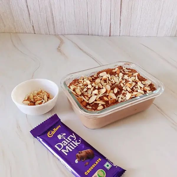 Chocolate Rice Pudding Mousse with Almond Crunch - Sprinkle chopped almonds