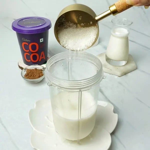 Chocolate Shake With Gond Katira - Combine milk & sugar first
