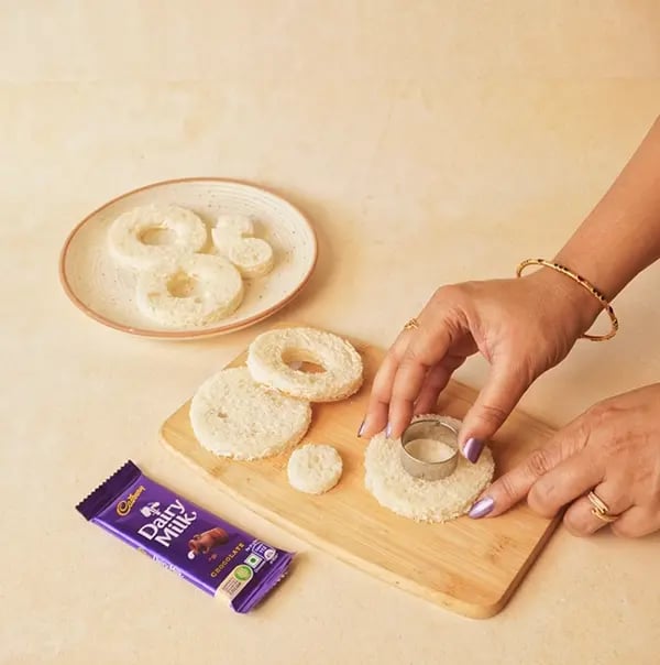 Chocolate Toast Wreaths with Cadbury Dairy Milk-Then use a smaller round cookie cutter