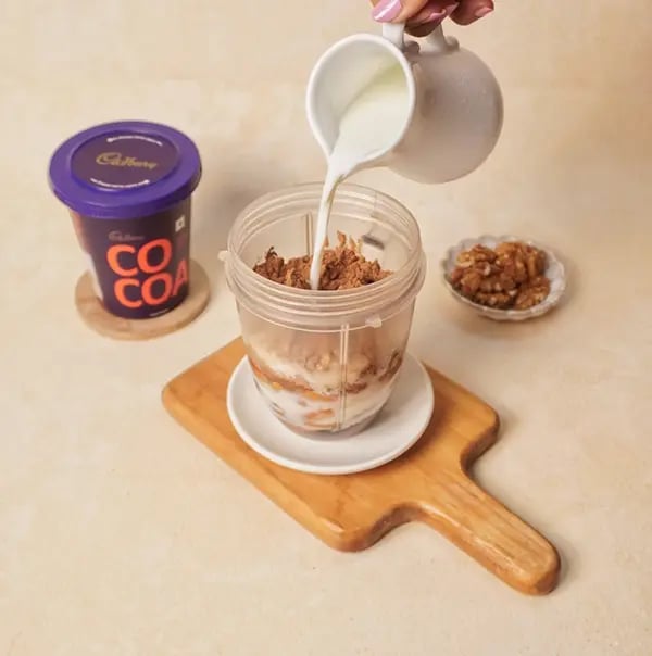 Chocolate Walnut Almond Fudge with Cadbury Bournville-Pour in the boiled and chilled milk