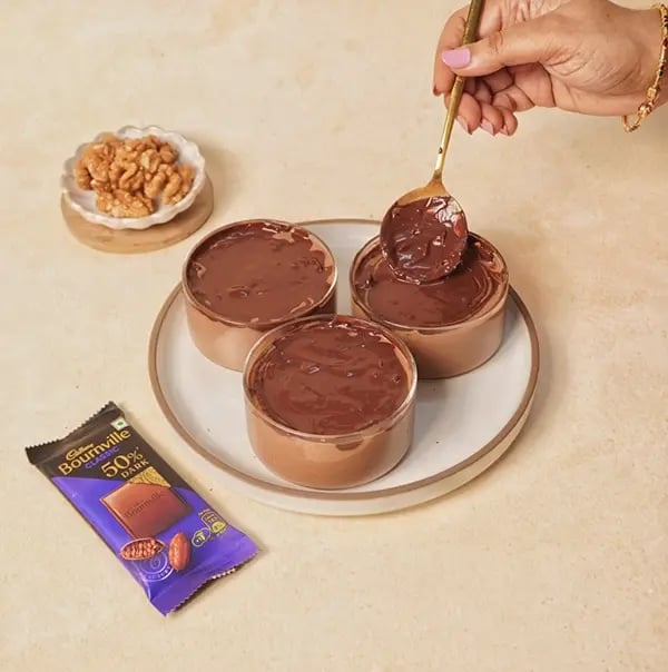 Chocolate Walnut Almond Fudge with Cadbury Bournville-Drizzle the melted chocolate