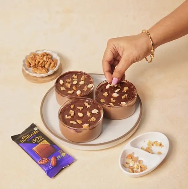 Chocolate Walnut Almond Fudge with Cadbury Bournville-Garnish with the roasted