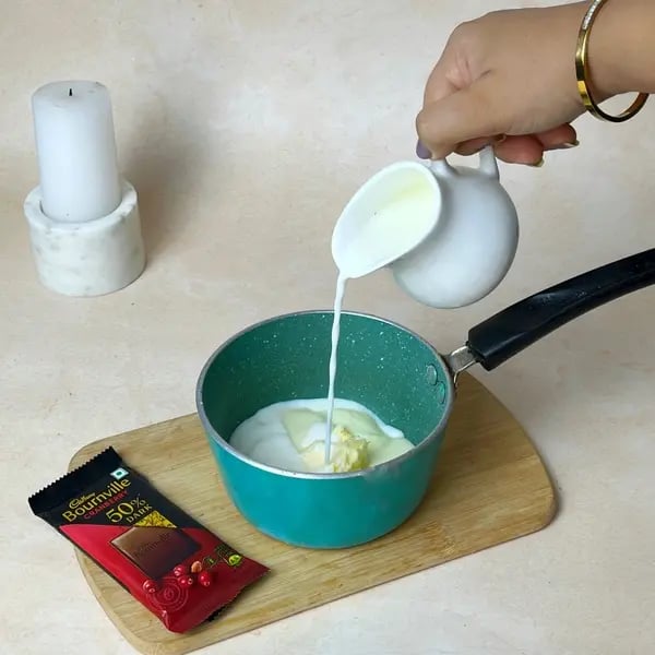 Classic Bournville Hot Fudge Sundae - Milk Simmering In Pot