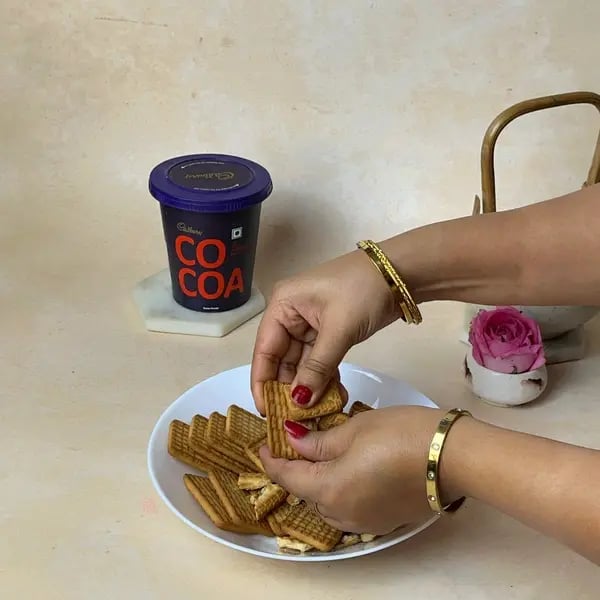 Cocoa Bournville Chocolate Nobake Biscuit Cake - Crushed Biscuits In Bowl