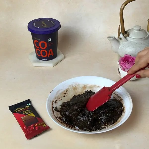 Cocoa Bournville Chocolate Nobake Biscuit Cake - Soft Batter Being Mixed