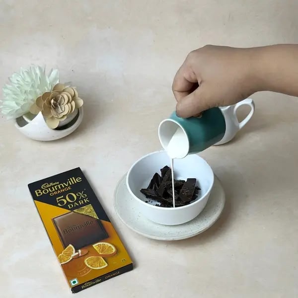 Cocoa Cake With Bournville Ganache - Pouring Cream Over Chocolate