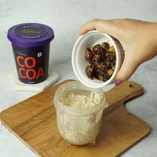 Cocoa Dry Fruit Laddoos - Add the soaked dates