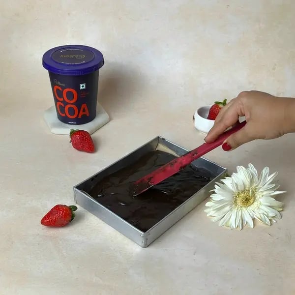 Cocoa Flourless No Bake Berry Brownie - Batter Over Berries