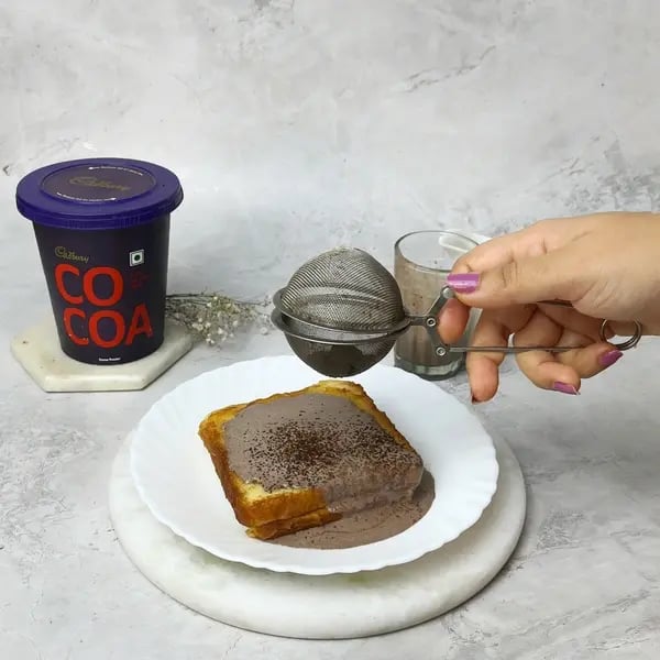 Cocoa French Toast - Sifting Cocoa Powder
