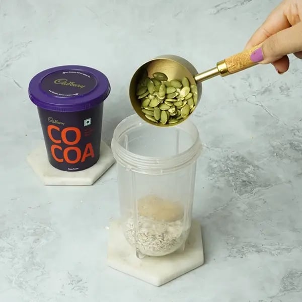 Cocoa Granola Bar Vegan Style-Add pumpkin seeds next