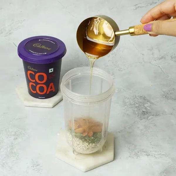 Cocoa Granola Bar Vegan Style-Add honey next for sweetness