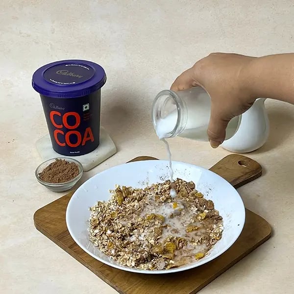 Cocoa Granola Overnight Oats- Next add milk for thickness