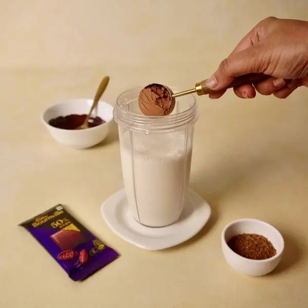 Cocoa Icecream Milkshake With Melted Bournville Chocolate - Adding Ingredients Blender