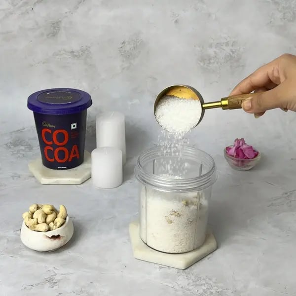 Cocoa Kaju Coconut Roll Sweet - Adding