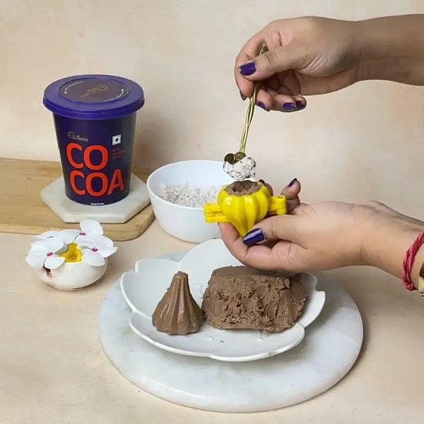 Cocoa Mothagam Recipe: How To Make This South Indian Festive Delight At Home - Filling Dough Mold