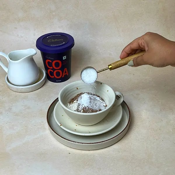 Cocoa Mugcake With Marshmallow -For sweetness add sugar