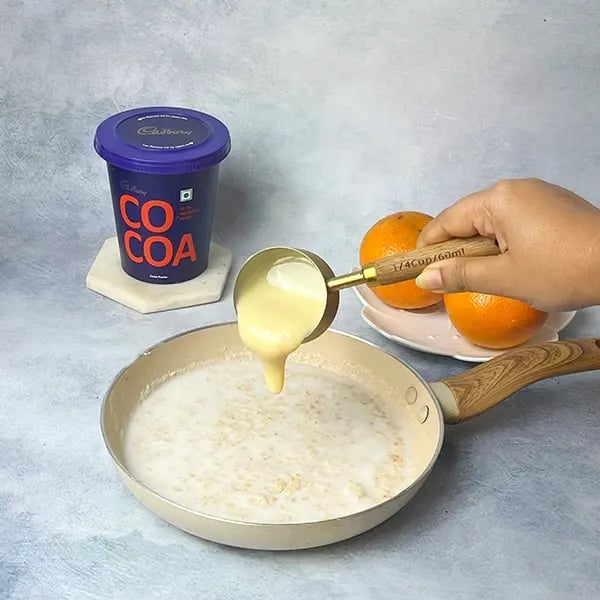 Cocoa Oats Orange Rabdi-Add condensed milk