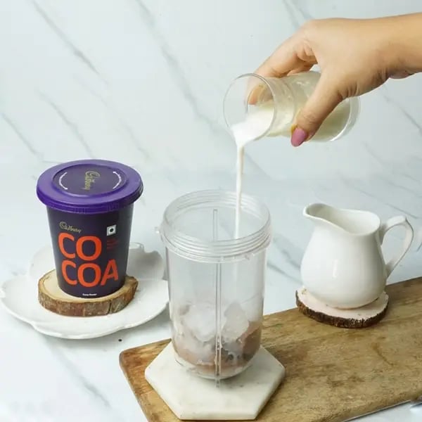 Cocoa Oreo Peanut Butter Shake - Pour milk over them