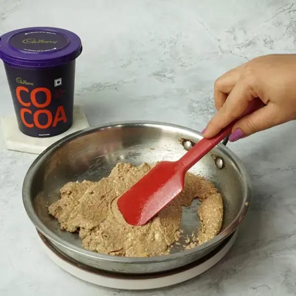 Cocoa Sandesh With Nuts - Cook it over low heat