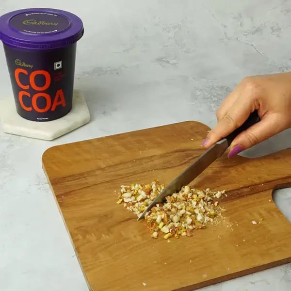 Cocoa Sandesh With Nuts - Chop your choice of dry fruits