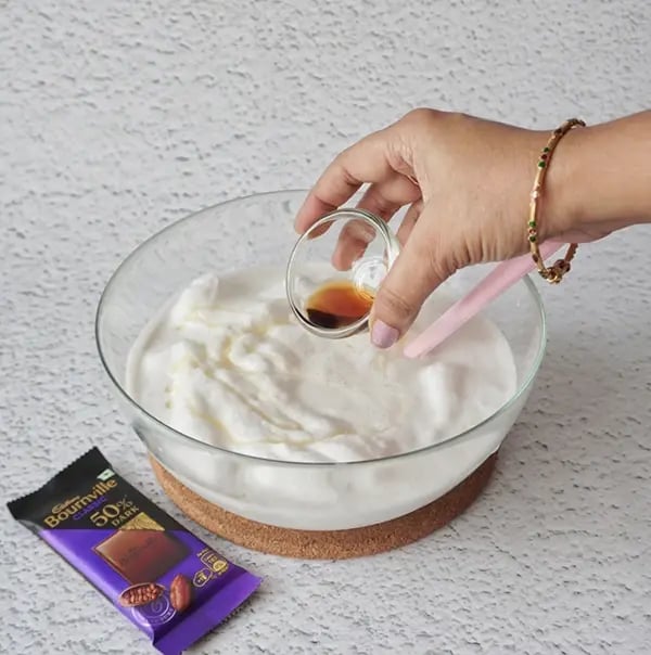 Coconut Ice Cream with Bournville Crunch - Add vanilla essence
