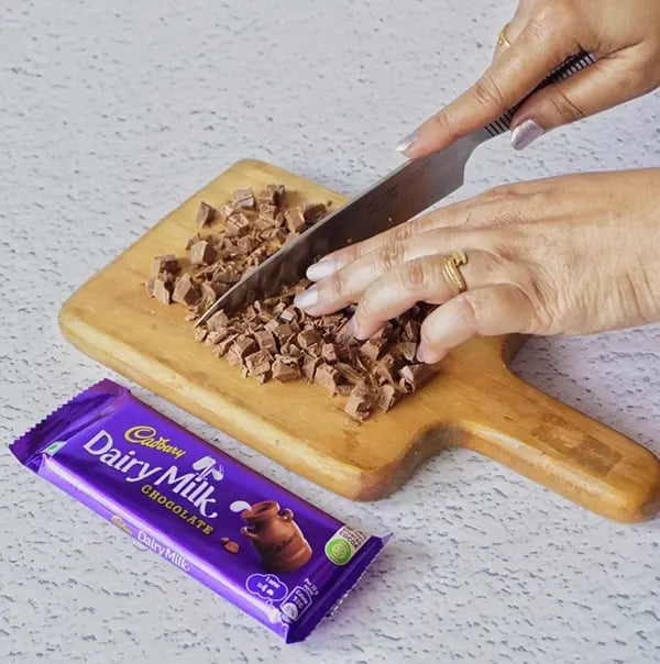 Coconut Laddoo With Dairy Milk And Jaggery-Chop the Cadbury Dairy milk chocolate