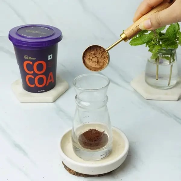 Cold Brew Mint Mocha Drink - Take a glass jar and add coffee powder, sugar, and cocoa powder