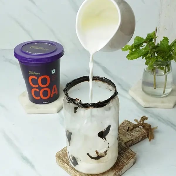 Cold Brew Mint Mocha Drink - Pour chilled milk on the glass