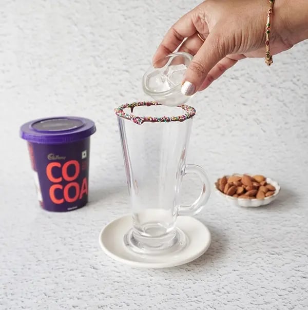 Cold Cocoa with Nuts & Dates - Few ice cubes into a serving glass