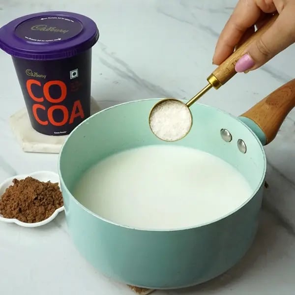 Creamy Cocoa Custard Milkshake - Medium-sized pan and boil milk
