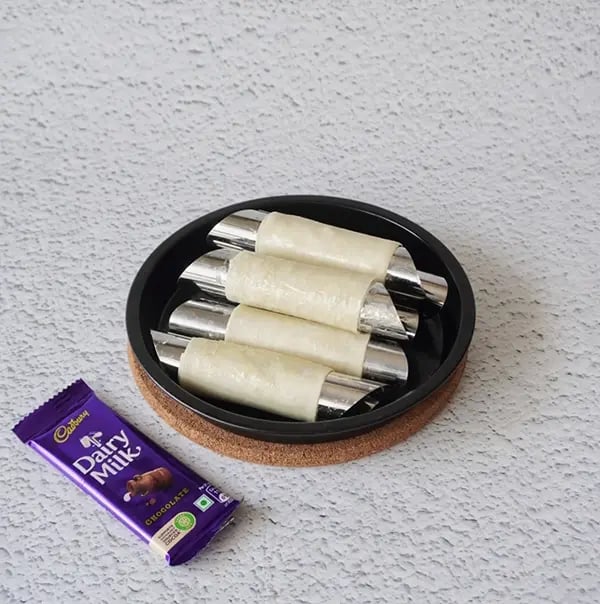 Crispy Rolls with Coconut and Dairy Milk Chocolate- Air fry the cones at 180°C for 7–8 minutes