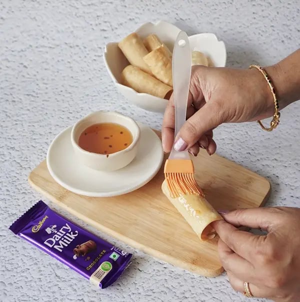 Crispy Rolls with Coconut and Dairy Milk Chocolate- Brush the cooled cones with honey