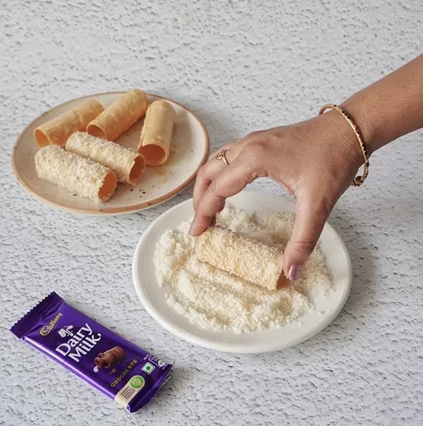 Crispy Rolls with Coconut and Dairy Milk Chocolate- Roll them in desiccated coconut
