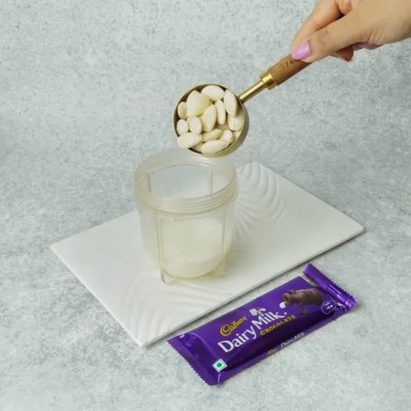 Dairy Milk Almond Peda-After soaking remove the skin from the almonds carefully