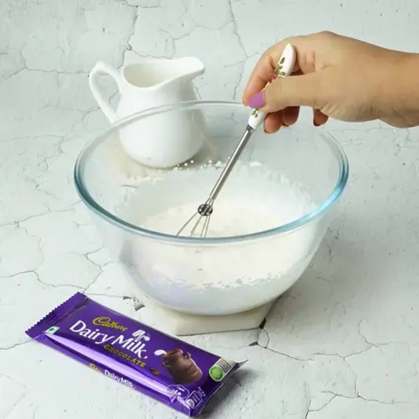 Dairy Milk Choco Fruit Cream Dessert - Blend the mixture using a hand mixer