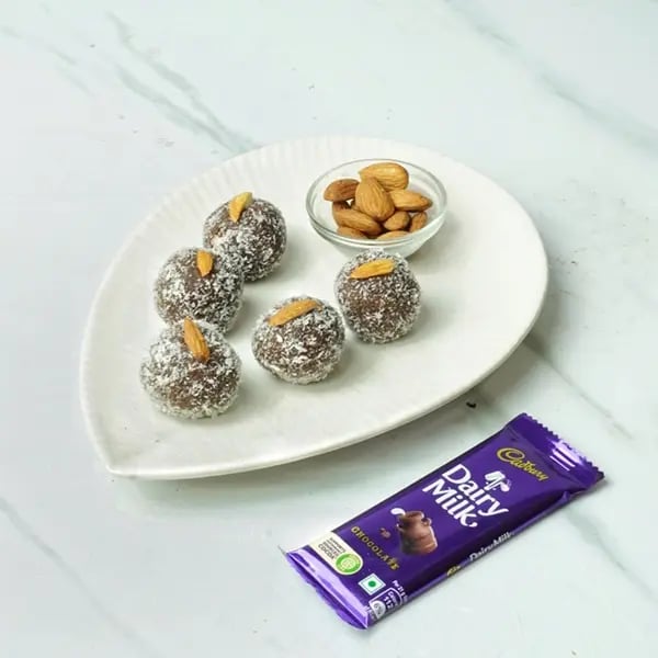 Dairy Milk Chocolate Almond Laddu - Decorate with some almonds