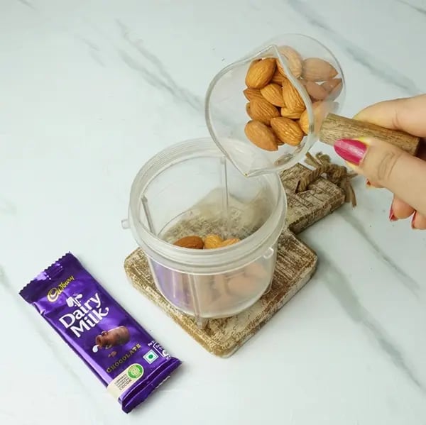 Dairy Milk Chocolate Almond Laddu - Grind them into a fine powder