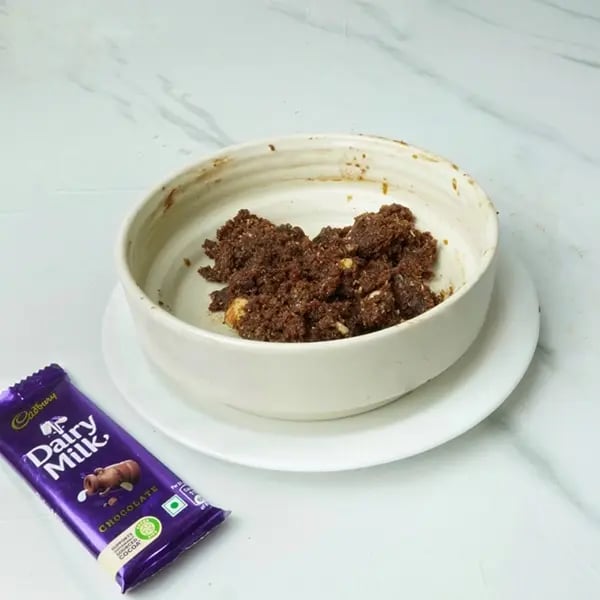 Dairy Milk Chocolate Almond Laddu - Mix everything until you get tight dough