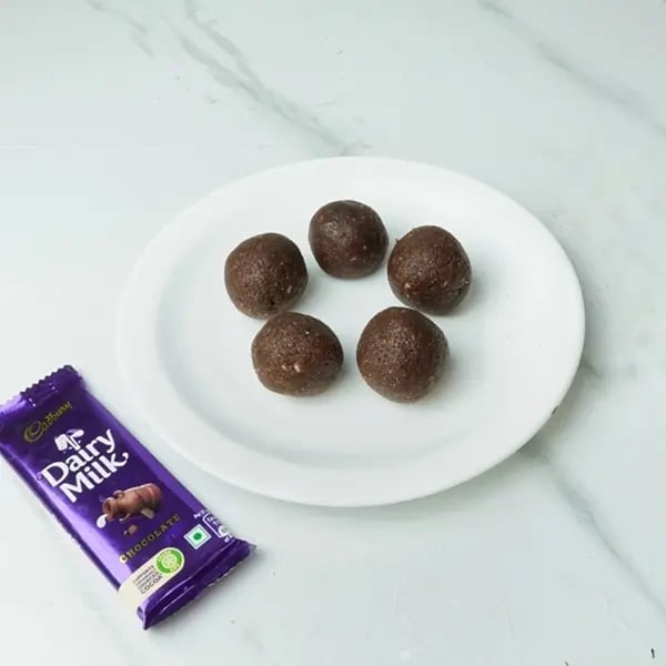 Dairy Milk Chocolate Almond Laddu - Make small balls or laddu shape
