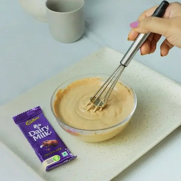 Dairy Milk Chocolate Bhapa Doi - Whisk this mixture