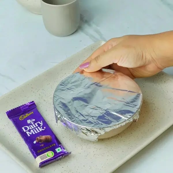 Dairy Milk Chocolate Bhapa Doi - Cover it with aluminum foil