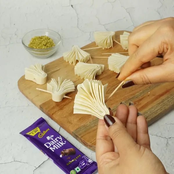 Dairy Milk Coated Baklava Fan Sweet-Gently insert a toothpick